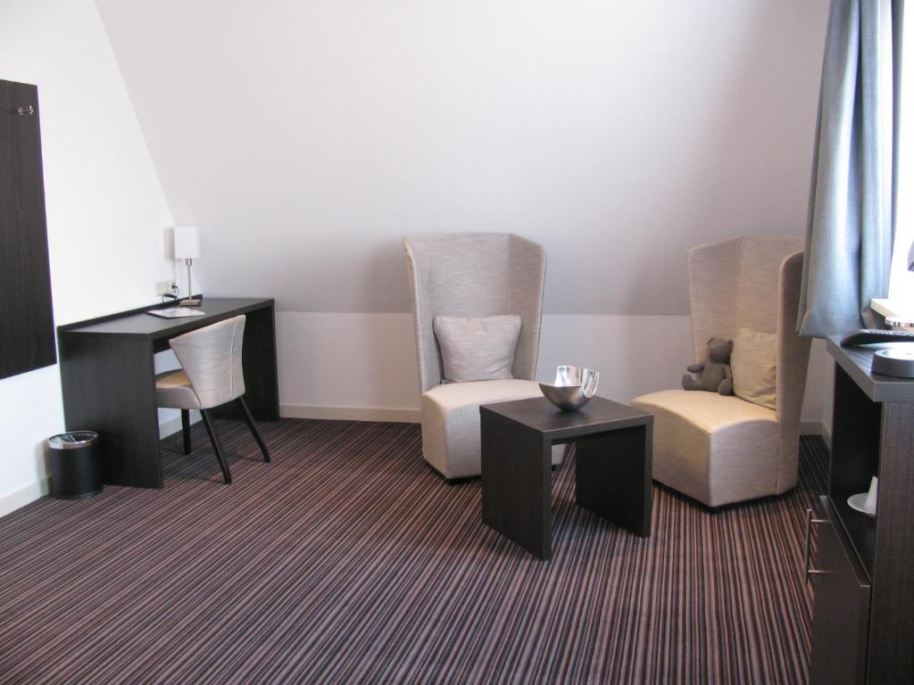 Boutique Hotel De Zwaluw De Koog  Room photo